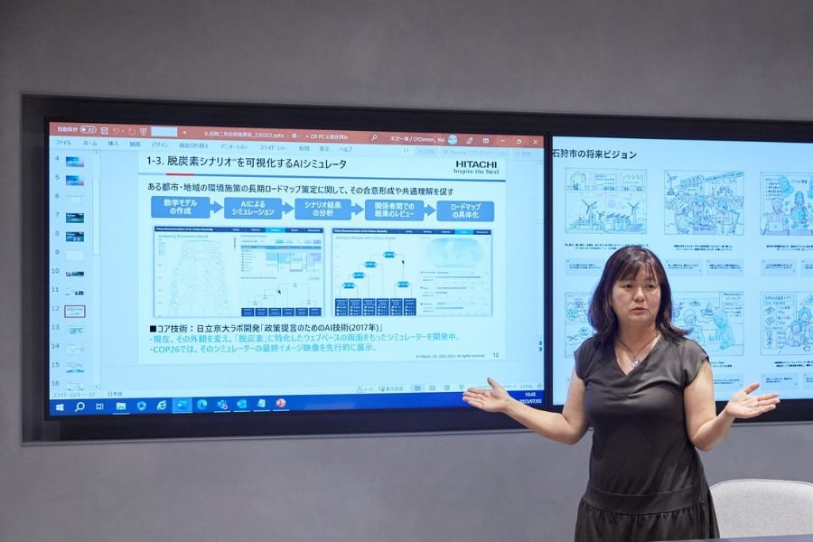 Yukiko Morimoto explaining the Decarbonization scenario simulator